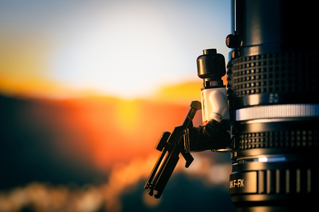 Professional broadcast camera on a tripod set up outdoors